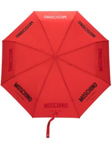 Moschino parapluie à logo imprimé - Rouge