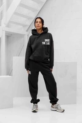 Unique The Label Elyana Trainingspak Dames Donkergrijs - Maat M - Kleur: Donkergrijs | Soccerfanshop