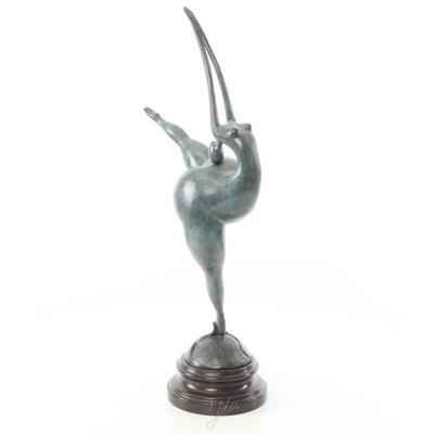 A MODERNIST BRONZE SCULPTURE OF A NUDE FEMALE DANCER
