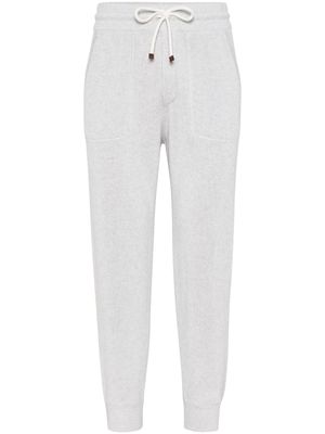 Brunello Cucinelli pantalon de jogging à design texturé - Blanc