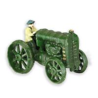 A CAST IRON MODEL OF A TRACTOR