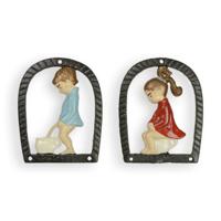 A PAIR OF CAST IRON BOY AND GIRL TOILET SIGNS