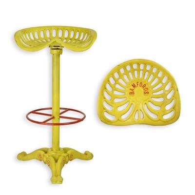A CAST IRON BAR STOOL, YELLOW AND RED