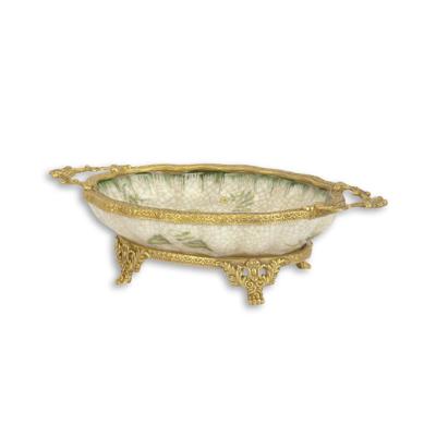 A BRONZE MOUNTED PORCELAIN PLATE