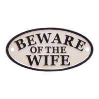 A CAST IRON "BEWARE OF THE WIFE" PLAQUE