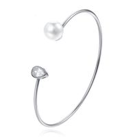 Zilverkleurige armband met Ovale Zirkonia Steen en Imitatie Parel