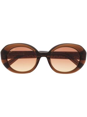 Swarovski Eyewear lunettes de soleil à monture ovale ornée de cristal - Marron