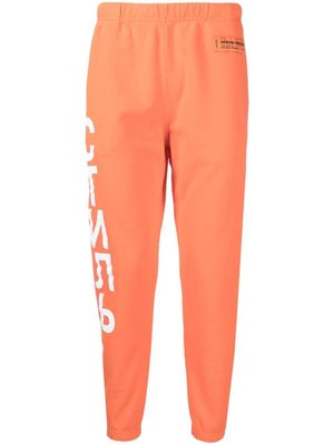 Heron Preston pantalon de jogging à logo СТЛЬ - Orange