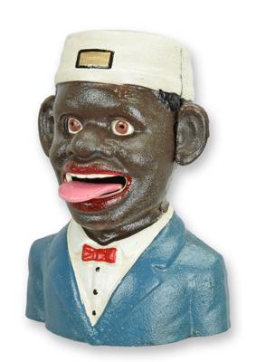 A CAST IRON BLACK MAN MECHANICAL BANK