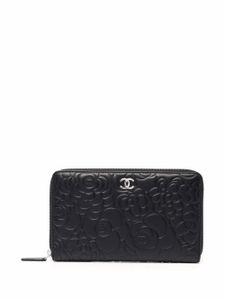 CHANEL Pre-Owned portefeuille zippé à motif Camélia (2011) - Noir