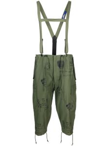 Junya Watanabe Comme des Garçons Pre-Owned x Jean-Michel Basquiat pantalon à coupe courte - Vert