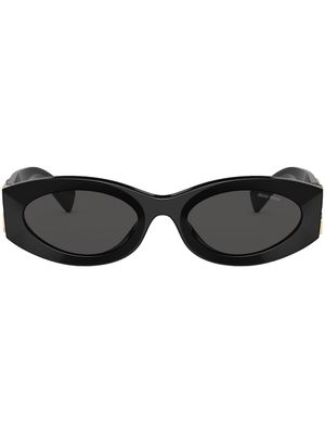 Miu Miu Eyewear lunettes de soleil à monture papillon - Gris