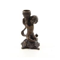 A BRONZE PUTTO CANDLESTAND A BRONZE PUTTO CANDLESTAND