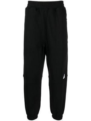 izzue pantalon de jogging à logo appliqué - Noir