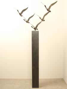 5 bronzen zwanen