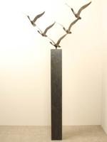 5 bronzen zwanen