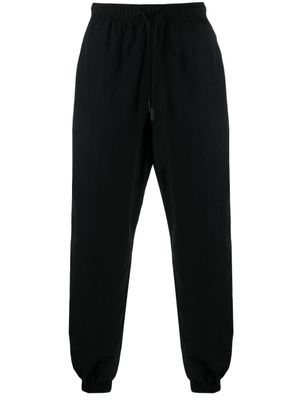 Marcelo Burlon County of Milan pantalon de jogging à patch logo - Noir