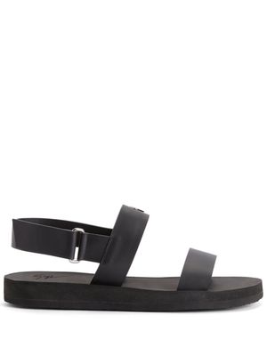Giuseppe Zanotti sandales Saiph en cuir à plaque logo - Noir