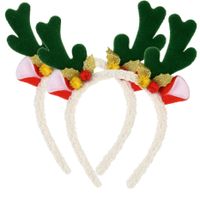 Kerst diadeem/haarband - 2x - rendier gewei - groen - 21 cm