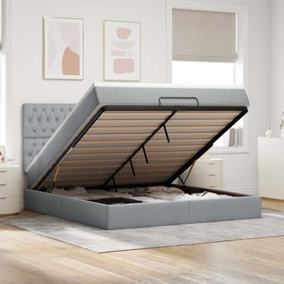 Ottoman bed met matras en LED's 160x200cm stof lichtgrijs