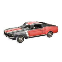 A TIN MODEL OF A MUSCLE CAR
