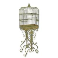 AN IRON BIRDCAGE ON STAND AN IRON BIRDCAGE ON STAND