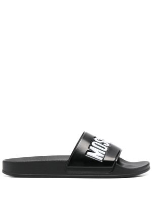 Moschino claquettes à logo embossé - Noir