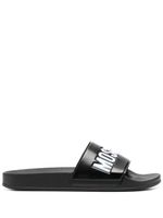 Moschino claquettes à logo embossé - Noir