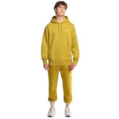 Nike Sportswear Club Fleece Joggingpak Hooded Donkergeel Wit Nike Sportswear Club Fleece Joggingpak Hooded Donkergeel Wit