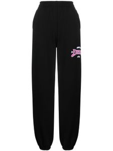 Versace pantalon de jogging à logo imprimé - Noir