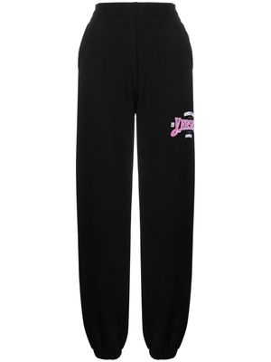 Versace pantalon de jogging à logo imprimé - Noir
