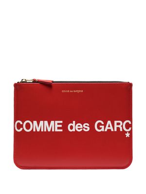 Comme Des Garçons Wallet pochette en cuir à logo imprimé - Rouge