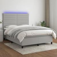Boxspring met matras en LED stof lichtgrijs 140x190 cm