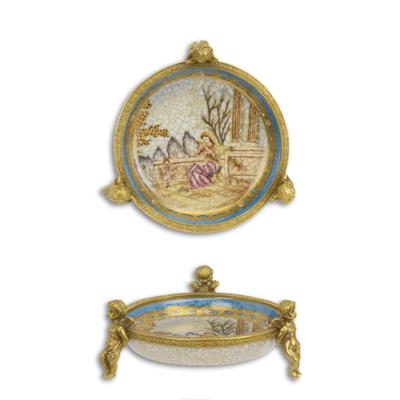 A BRONZE MOUNTED PORCELAIN DISH