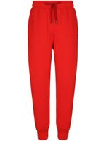 Dolce & Gabbana pantalon de jogging fuselé à lien de resserrage - Rouge