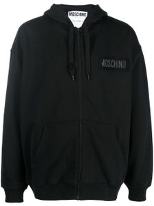 Moschino hoodie zippé à logo imprimé - Noir