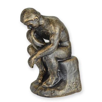 A CAST IRON SCULPTURE OF THE THINKER COLOR BRONZE