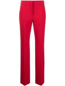 Moschino pantalon de tailleur à plis marqués - Rouge