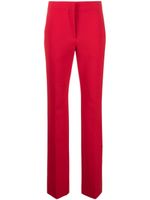 Moschino pantalon de tailleur à plis marqués - Rouge