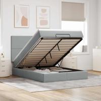 Ottoman bed met matras en LED's 140x200cm stof lichtgrijs