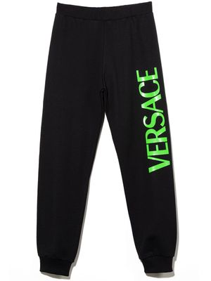 Versace Kids pantalon de jogging fuselé à logo imprimé - Noir