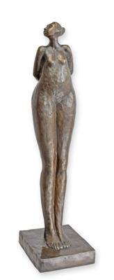 A BRONZE SCULPTURE OF A BROWN ELEPHANT
