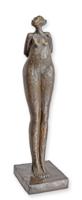 A BRONZE SCULPTURE OF A BROWN ELEPHANT A BRONZE SCULPTURE OF A BROWN ELEPHANT