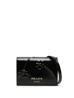 Prada portefeuille à main à fleurs embossées - Noir Prada portefeuille à main à fleurs embossées - Noir