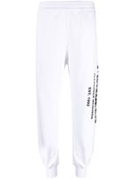 Alexander McQueen pantalon de jogging fuselé à logo imprimé - Blanc - thumbnail