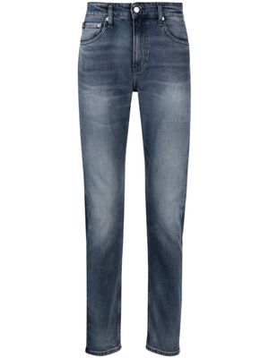 Calvin Klein Jeans jean droit à patch logo - Bleu