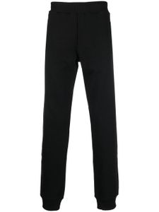 Just Cavalli pantalon de jogging en coton à logo imprimé - Noir