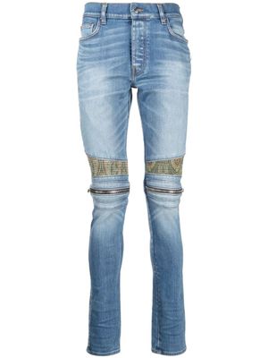 AMIRI jean skinny à détail de patch - Bleu