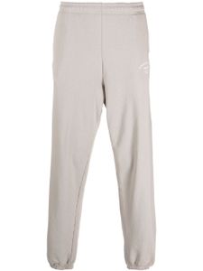 Sporty & Rich logo-print cotton track trousers - Tons neutres