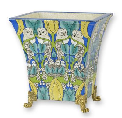 A BRONZE MOUNTED PORCELAIN PLANTER